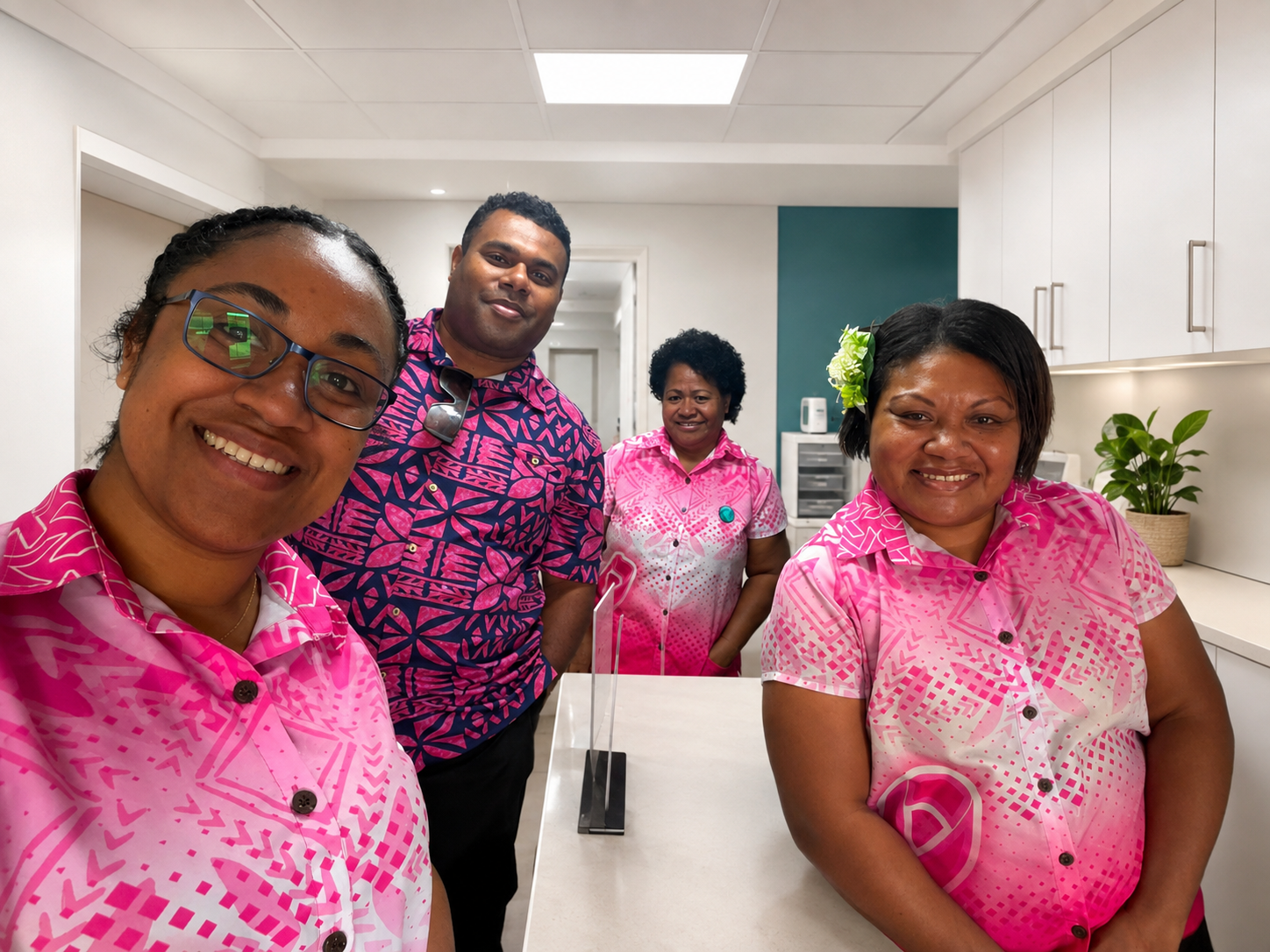 Ten Thousand Toes Wellness Clinic team in a modern clinic room